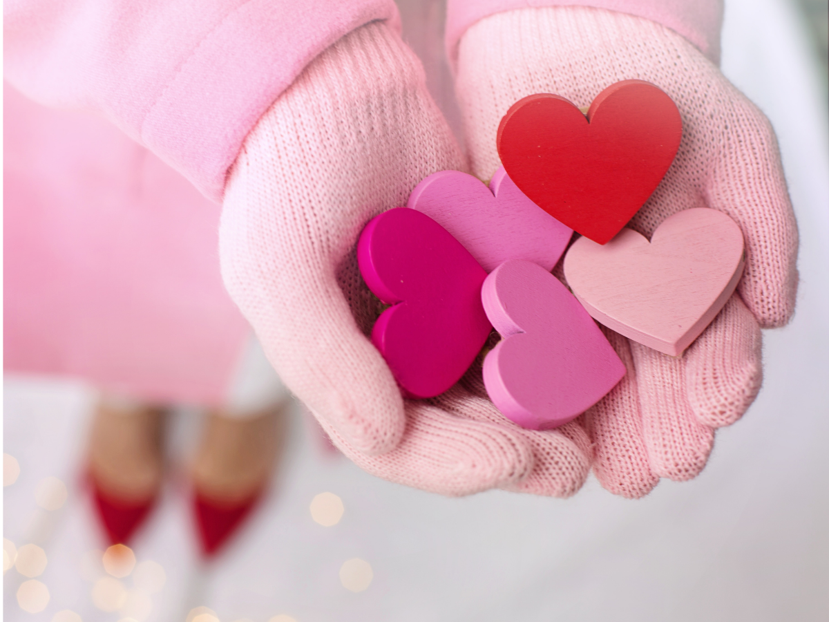 Hands holding Valentine hearts